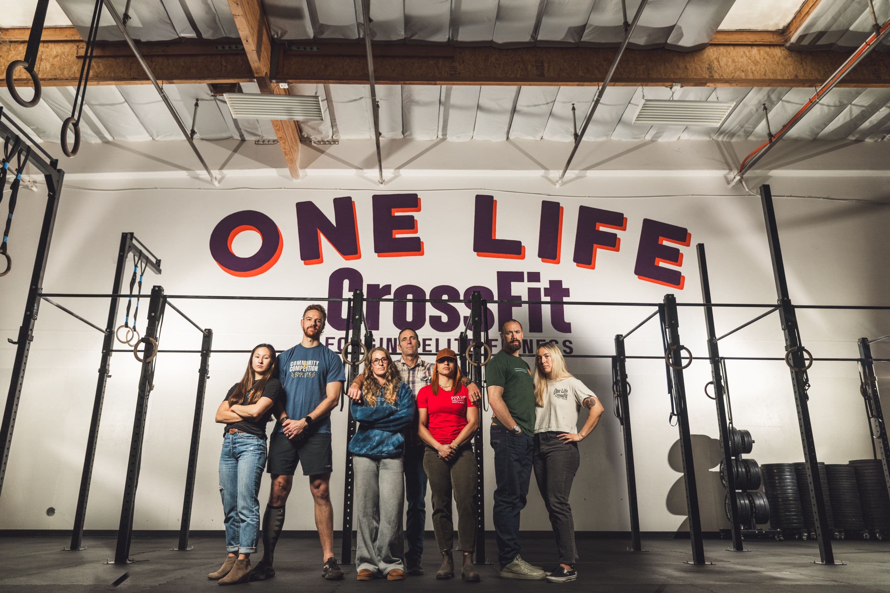 The One Life CrossFit coaching team on the Santa Maria gym floor